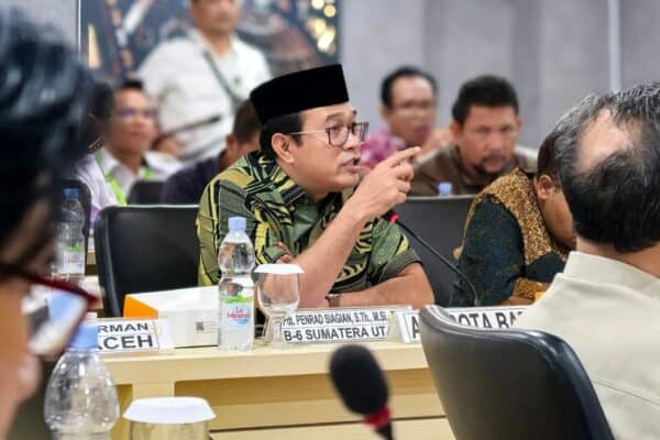 Senator Penrad Siagian speaking at forestry event in Nias Selatan.